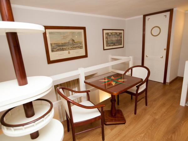 Dimora Caracciolo : photo 10 de la chambre chambre quadruple en duplex