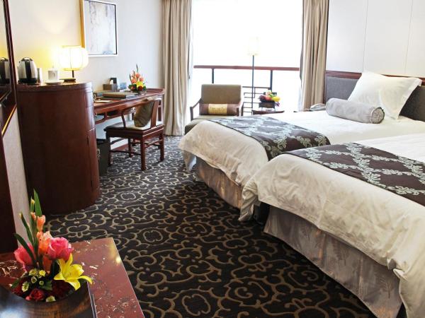 Xiyuan Hotel : photo 2 de la chambre chambre lits jumeaux exécutive (Étages 21 à 23)