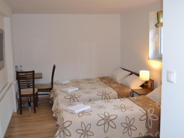 Kalinowy Sen : photo 2 de la chambre chambre triple avec kitchenette