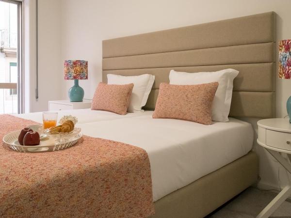 Simon Guest Apartments : photo 4 de la chambre grande chambre double ou lits jumeaux