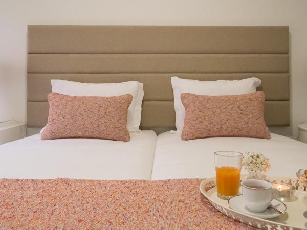 Simon Guest Apartments : photo 10 de la chambre grande chambre double ou lits jumeaux