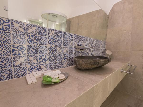 Santorini Secret Suites & Spa, Small Luxury Hotels of the World : photo 1 de la chambre suite lune de miel avec piscine privée - vue sur caldeira