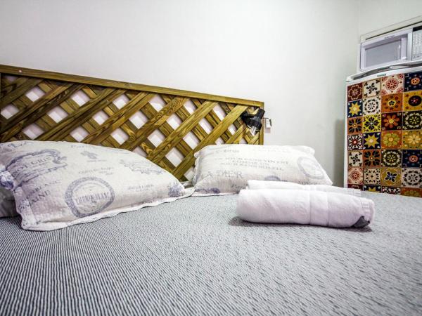 Baixo Copa Guest House : photo 9 de la chambre premium room with private bathroom.