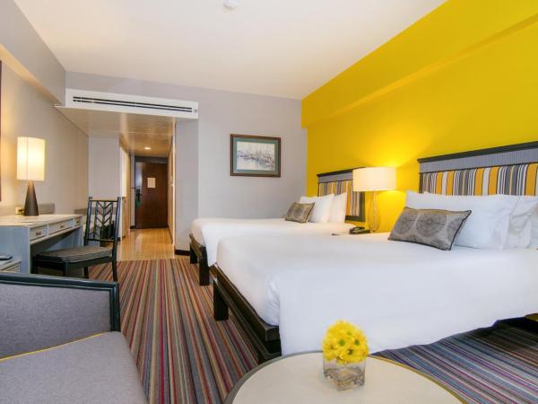 The Bayview Hotel Pattaya : photo 5 de la chambre chambre lits jumeaux deluxe - vue sur ville