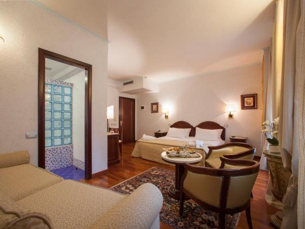 Majestic Toscanelli (centro storico) : photo 1 de la chambre suite junior