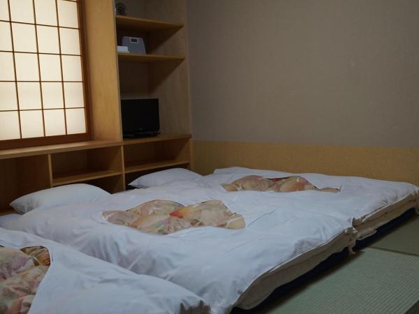 Annex Katsutaro Ryokan : photo 3 de la chambre chambre quadruple de style japonais