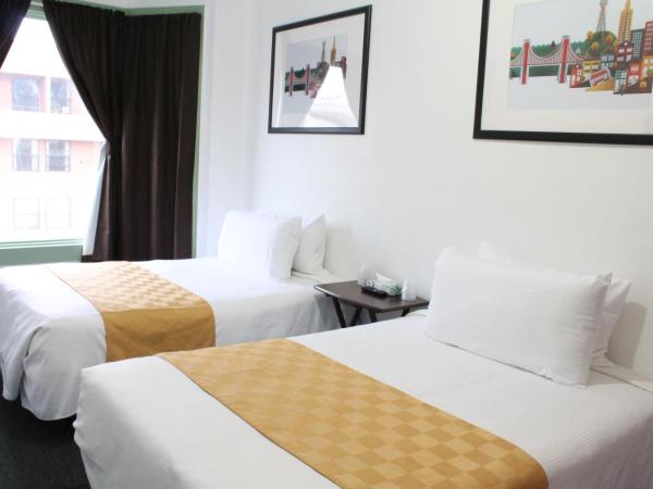 Union Hotel : photo 3 de la chambre chambre de luxe avec 2 lits doubles et salle de bains commune