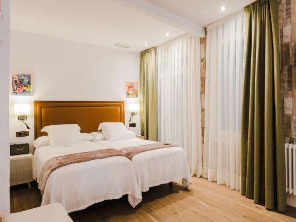 Pensión Boutique Caravan Cinema : photo 10 de la chambre chambre double ou lits jumeaux standard