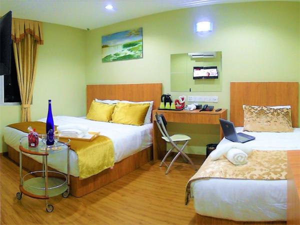 Royale Hotel Batu Gajah : photo 3 de la chambre chambre triple confort