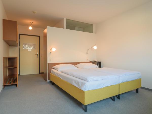 Kyriad Vienna Altmannsdorf : photo 4 de la chambre chambre lits jumeaux