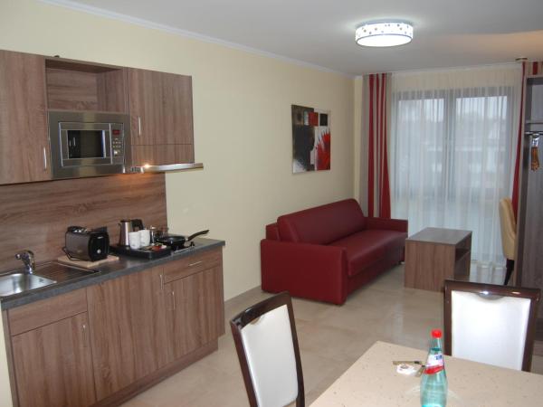 Naam Hotel & Apartments Frankfurt City-Messe Airport : photo 3 de la chambre appartement supérieur