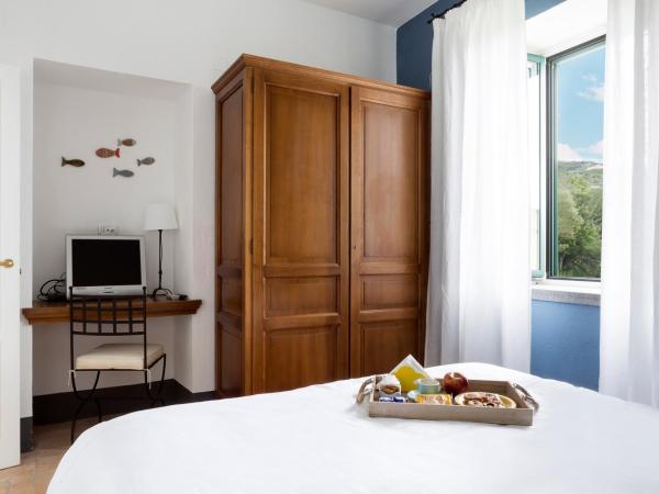 Relais Regina Giovanna : photo 8 de la chambre appartement 2 chambres - bâtiment séparé