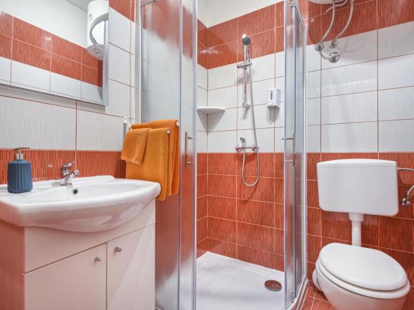 Top Center Rooms & Studio : photo 3 de la chambre chambre double ou lits jumeaux - vue sur ville