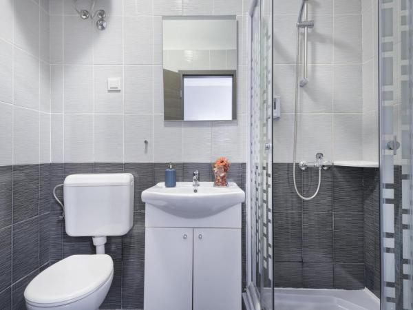 Top Center Rooms & Studio : photo 4 de la chambre chambre double ou lits jumeaux