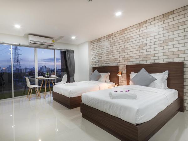 Q Space Residence : photo 3 de la chambre chambre quadruple avec balcon 