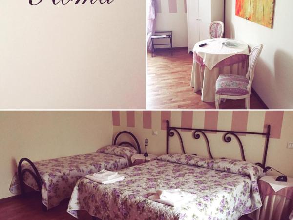 City's House Guest House : photo 1 de la chambre chambre quadruple avec salle de bains commune