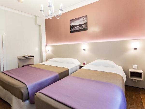 Modern Hotel : photo 1 de la chambre chambre lits jumeaux