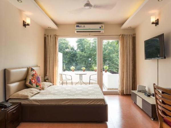 Amidst Monuments and Serenity : photo 1 de la chambre studio avec vue sur jardin