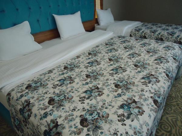 Golden Lounge Hotel : photo 1 de la chambre chambre triple deluxe