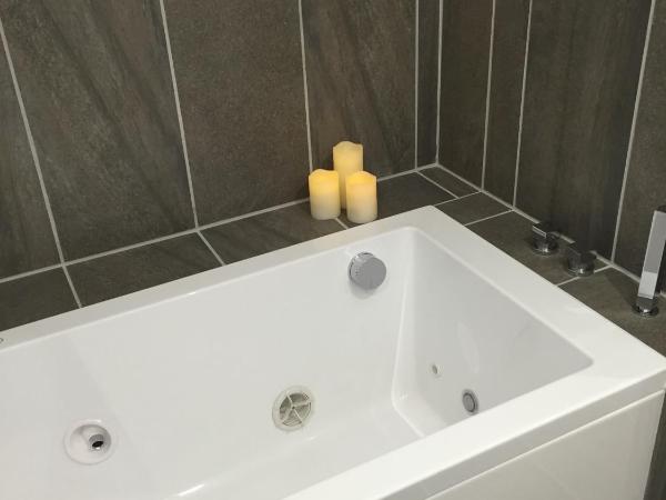 Hôtel du Bout du Monde : photo 3 de la chambre suite avec baignoire spa