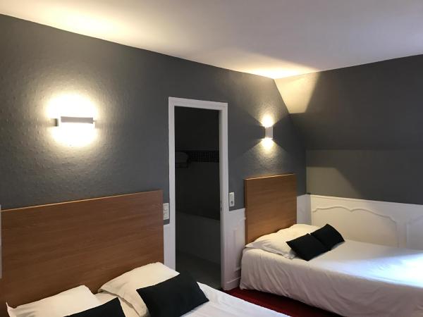 Htel La Rserve de Brive : photo 2 de la chambre chambre triple