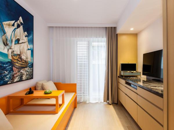 Caravel Hotel : photo 5 de la chambre suite lit queen-size deluxe