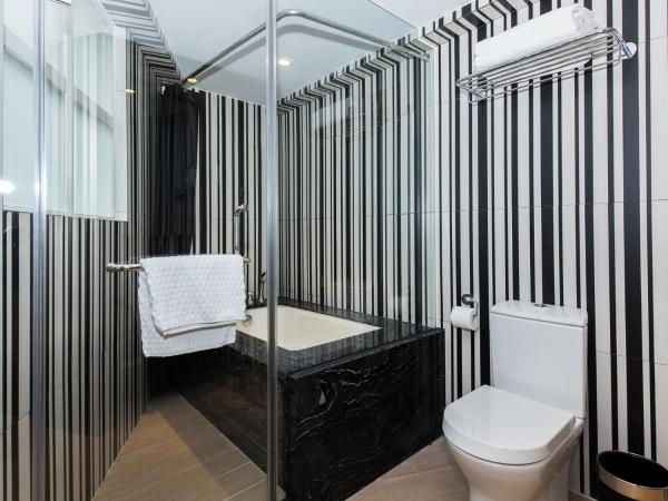 Caravel Hotel : photo 3 de la chambre suite lit queen-size deluxe