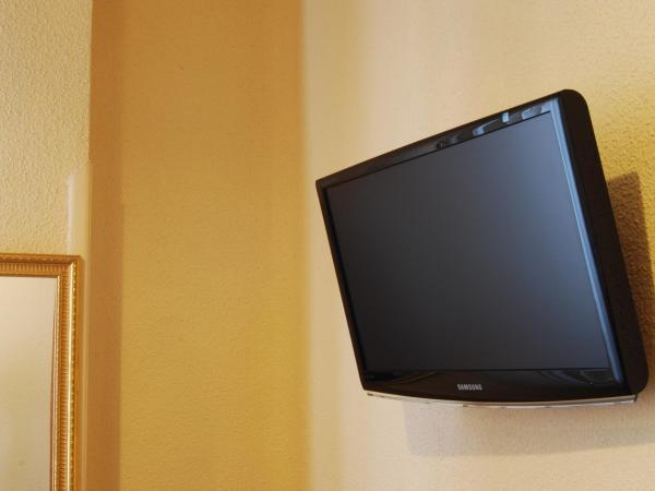 Hostal America : photo 5 de la chambre chambre triple