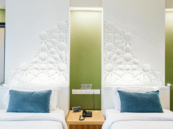 Raia Hotel Kota Kinabalu : photo 3 de la chambre chambre lits jumeaux supérieure