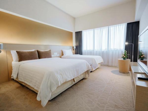 Raia Hotel Kota Kinabalu : photo 2 de la chambre chambre familiale deluxe