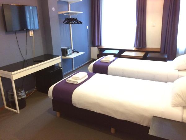 Hotel Bellington : photo 6 de la chambre chambre triple avec salle de bains privative