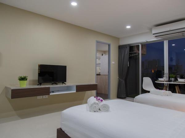 Q Space Residence : photo 6 de la chambre chambre quadruple avec balcon 