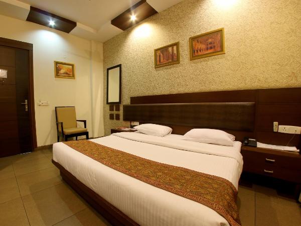 Enkay Residency M-Block Cyber City : photo 3 de la chambre chambre lits jumeaux supérieure