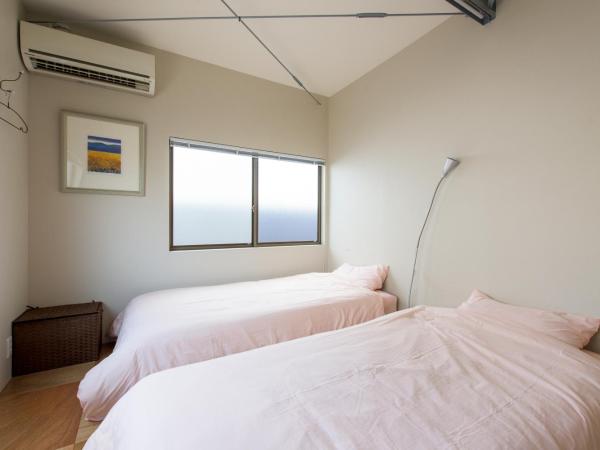 GrapeHouse Koenji : photo 2 de la chambre chambre lits jumeaux Économique pour femmes