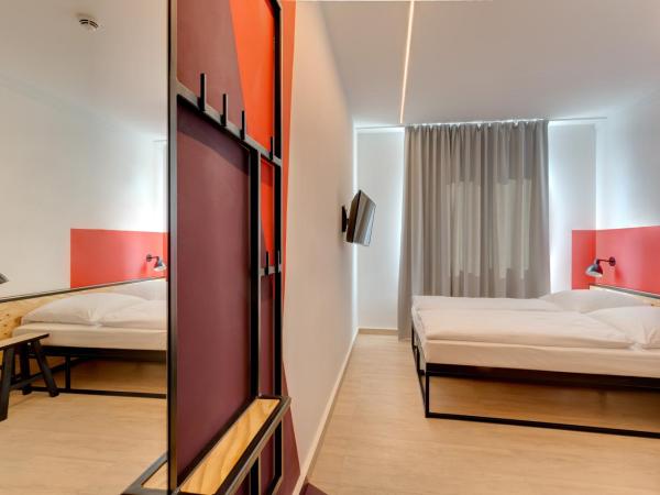 MEININGER Hotel Leipzig Hauptbahnhof : photo 3 de la chambre chambre lits jumeaux