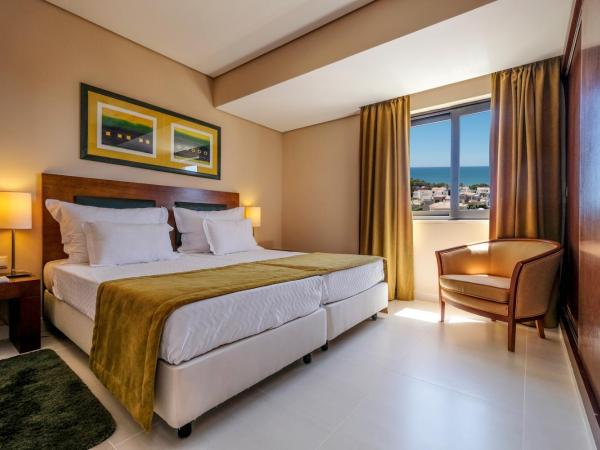 Vila Gale Atlantico : photo 2 de la chambre suite junior avec vue sur la mer (2 adultes + 2 enfants)