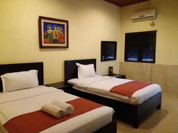 Alam Jogja Resort Mitra RedDoorz : photo 9 de la chambre chambre lits jumeaux