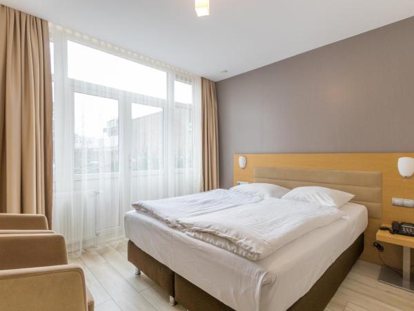 Hotel Port : photo 8 de la chambre chambre quadruple