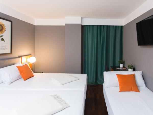 Hotel Malcom and Barret : photo 9 de la chambre chambre triple