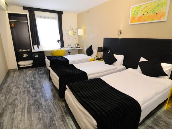 Tempo Hotel Caglayan : photo 2 de la chambre chambre double standard avec lit d'appoint