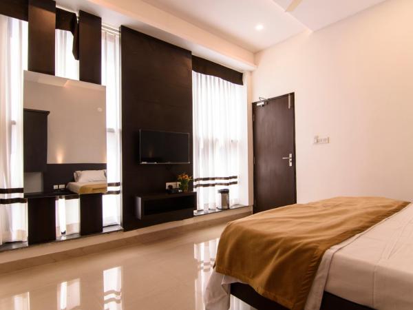 Ajantha Komforts, Bengaluru : photo 6 de la chambre chambre lits jumeaux deluxe