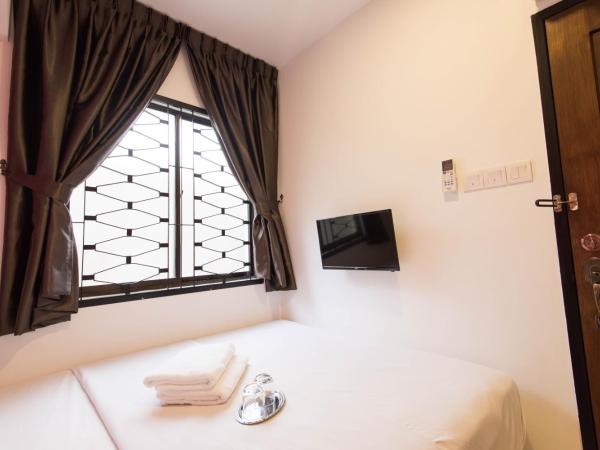 HomeStay 21 Hotel : photo 6 de la chambre chambre lit queen-size