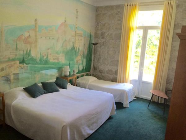Le Windsor, Jungle Art Hotel : photo 1 de la chambre chambre triple