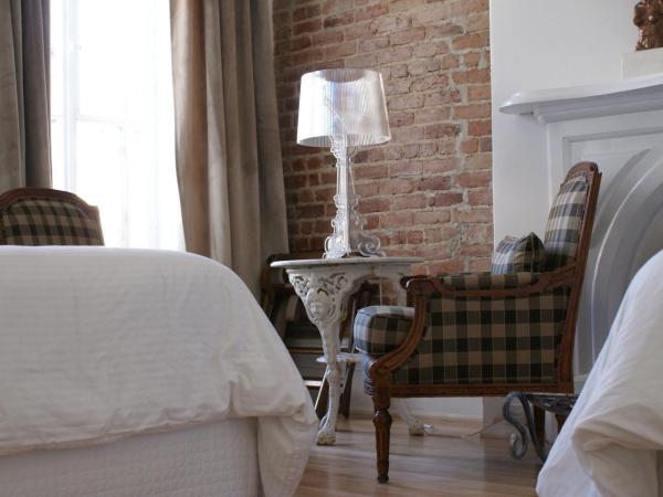 Hôtel Marie-Rollet : photo 2 de la chambre chambre double avec 2 lits doubles