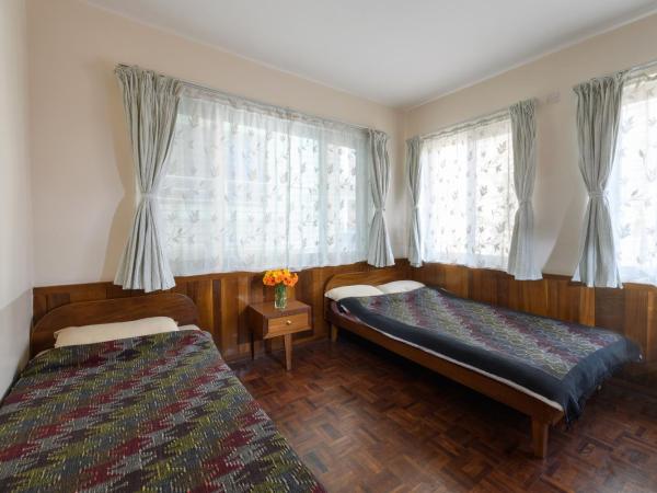 Dondrub Guest House : photo 2 de la chambre chambre lits jumeaux standard