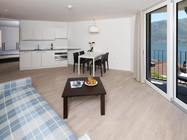 Hotel Stella SA : photo 2 de la chambre suite avec vue sur lac