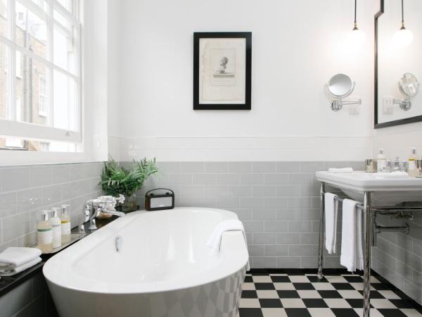 The Laslett : photo 3 de la chambre suite chambre principale