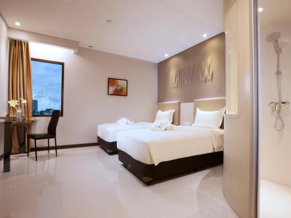 Verse Lite Hotel Gajah Mada : photo 3 de la chambre chambre deluxe double ou lits jumeaux