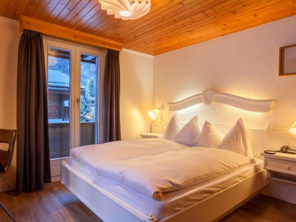 Hotel THE LARIX ski-in ski-out : photo 3 de la chambre chambre double nord