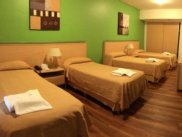 Intersur Suites : photo 4 de la chambre chambre quadruple